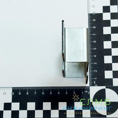 Скоба для крепления на гибкий перфорированный хомут 3мм Bayliss™